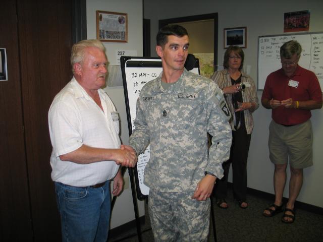 John Beebe receives a Challenge Coin